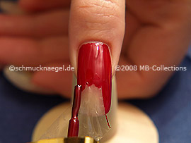 Nail lacquer in the colour red