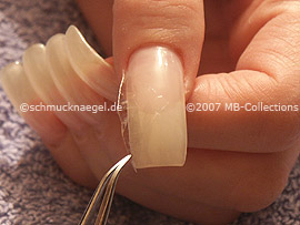 cutter, tweezers and clear adhesive tape