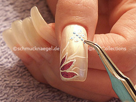 3D nail sticker in the form of a dragonfly or butterfly and the tweezers