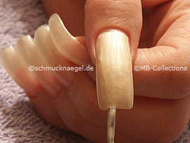 nail lacquer in the colour bright beige