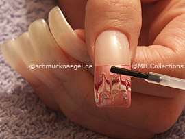 clear nail lacquer, the tweezers and a quadratic strass stone