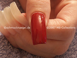 Nail lacquer in the colour dark-red